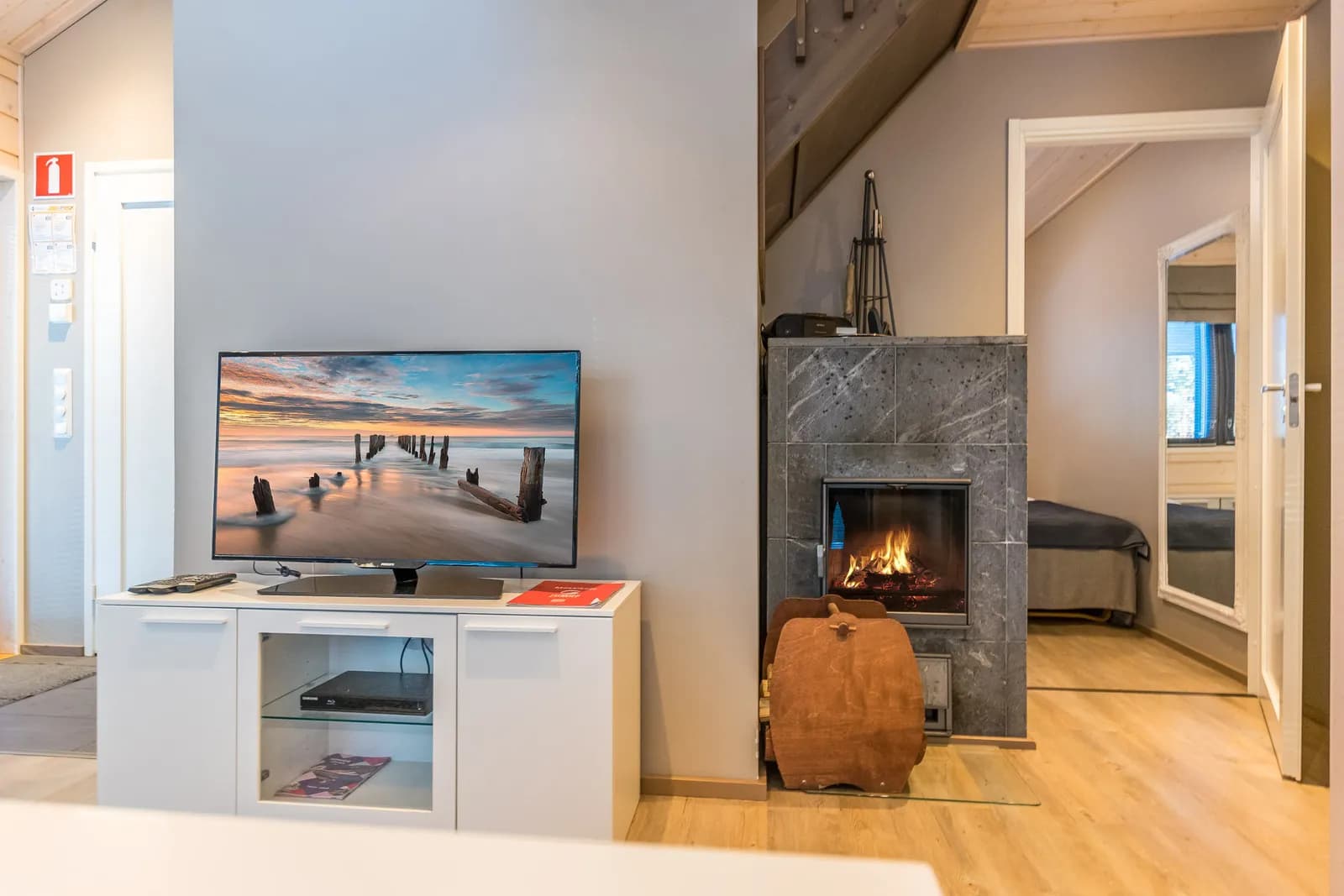 Fireplace and TV at Golfarinkunnas 9B