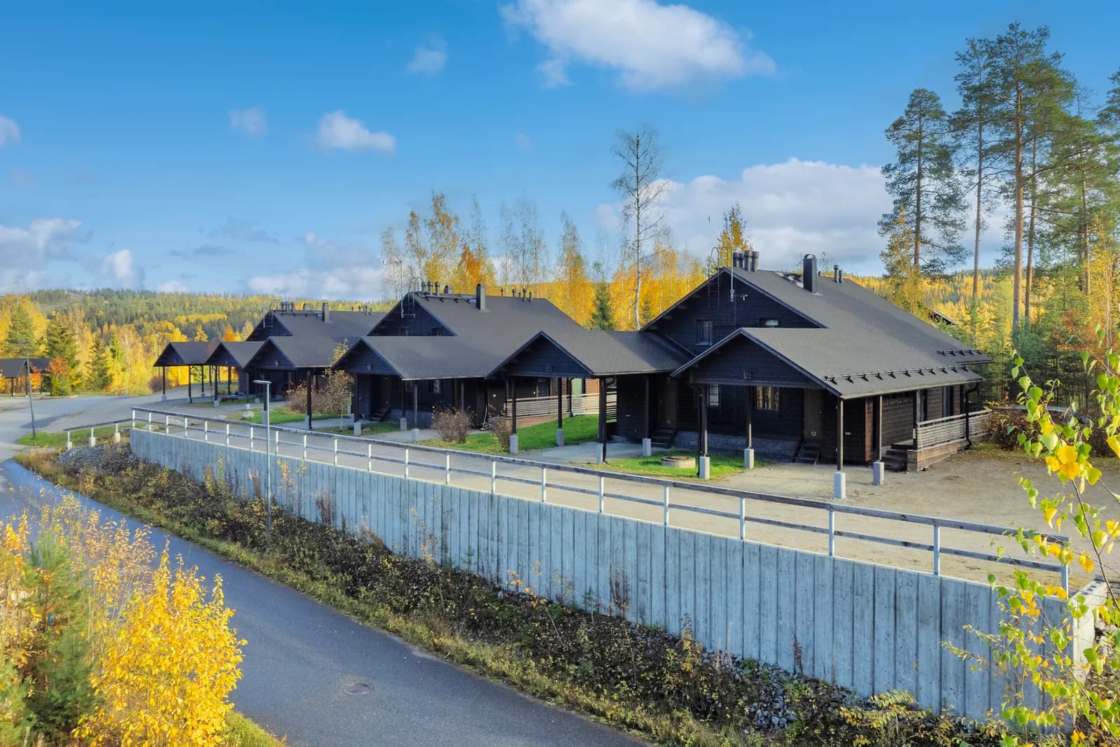 The Golfarinkunnas townhouses along the golf course in autumn