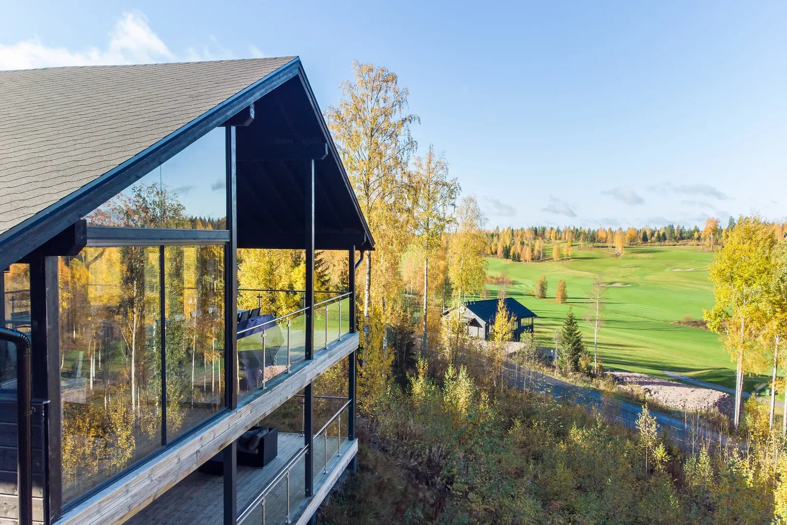Salavan Tsaari's glass facade looking over the golf course