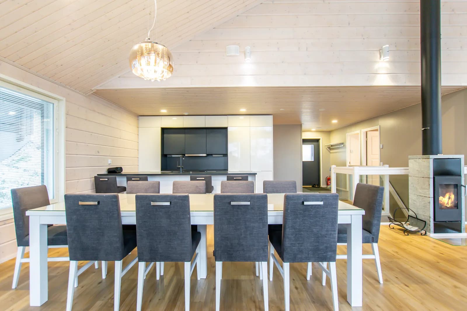 Dining table for twelve beside the fireplace at Salavan Tsaari