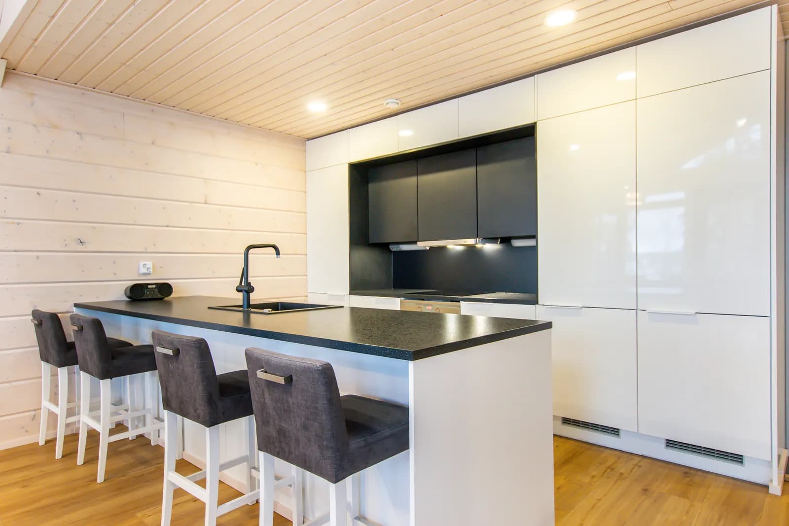 Kitchen island with bar seating at Salavan Tsaari